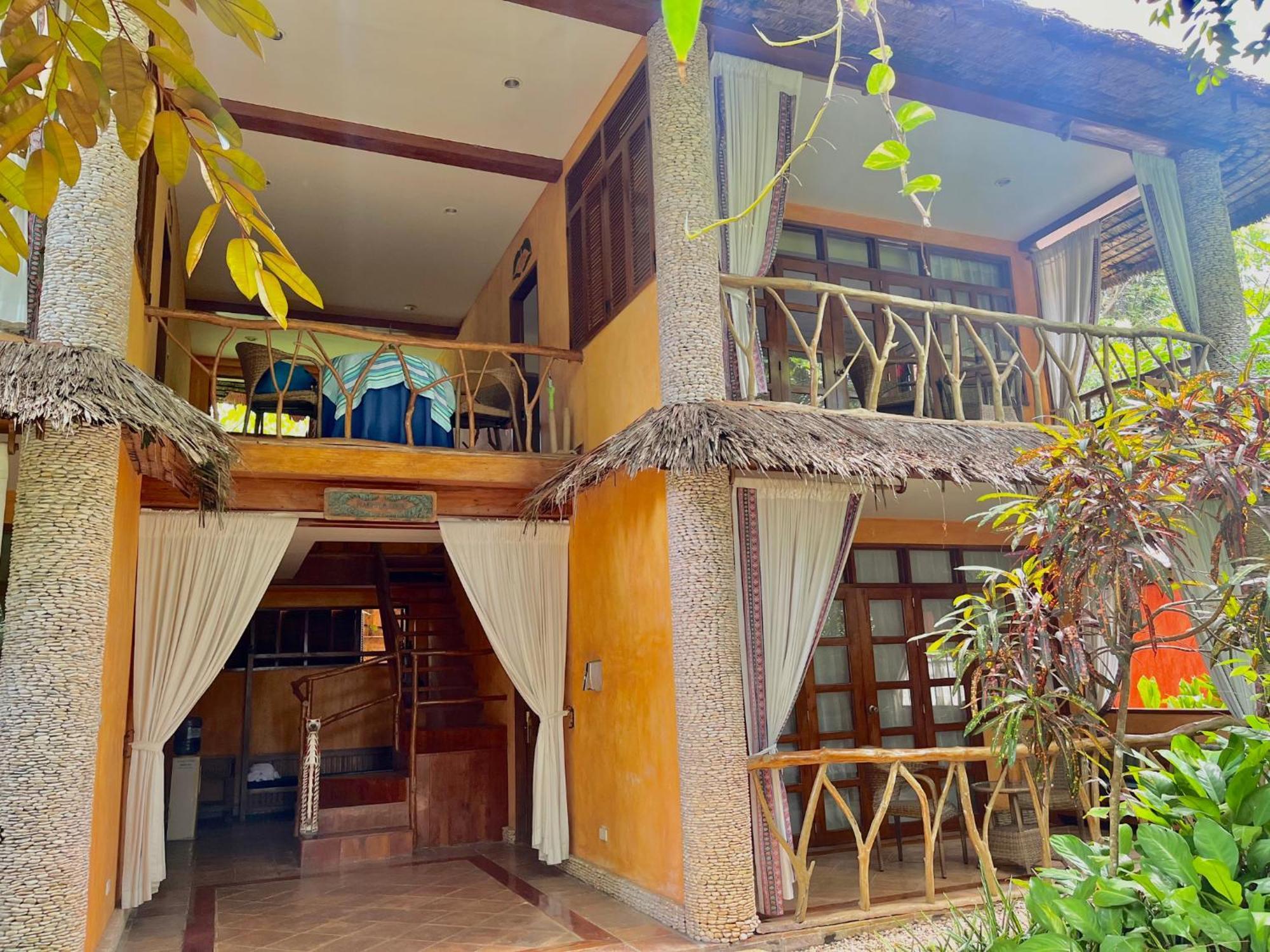 Coco Grove Beach Resort, Siquijor Island Exterior foto A villa at the resort