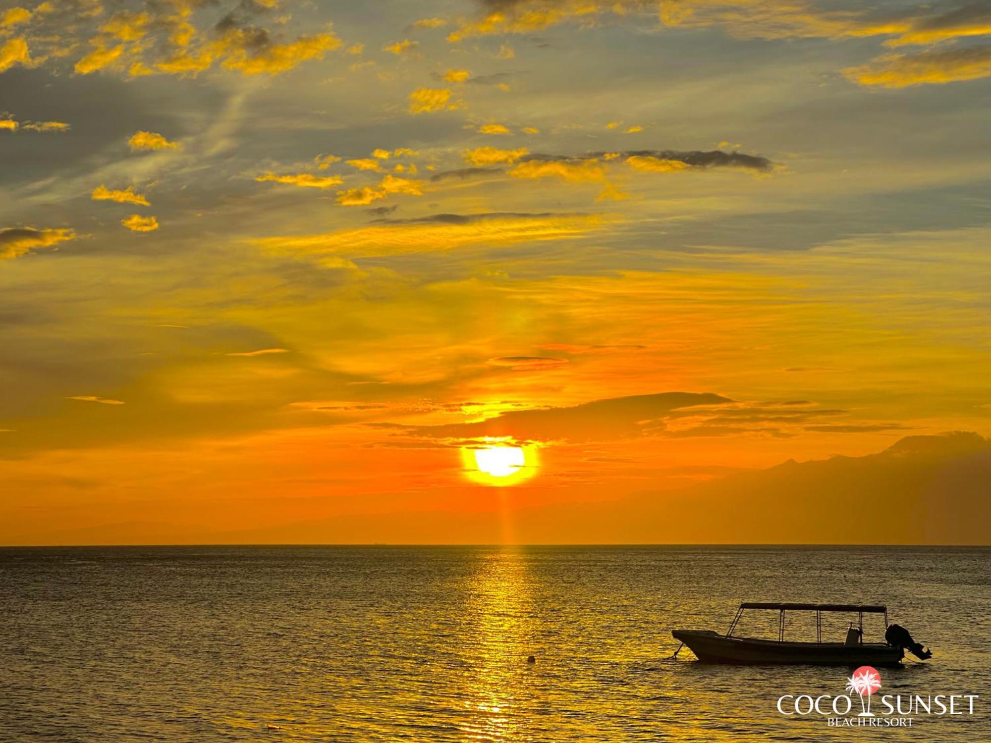 Coco Grove Beach Resort, Siquijor Island Exterior foto Sunset at Ooboi