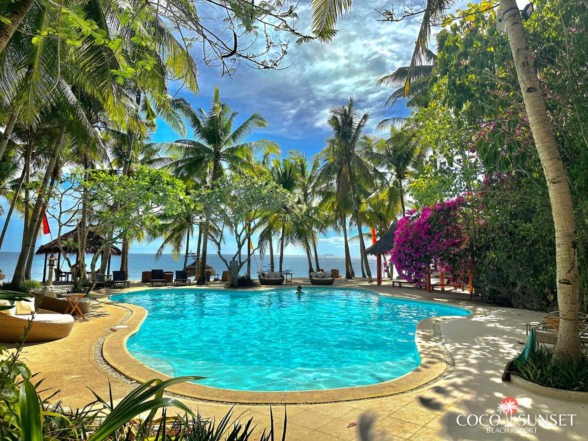 Coco Grove Beach Resort, Siquijor Island Exterior foto The pool at the resort