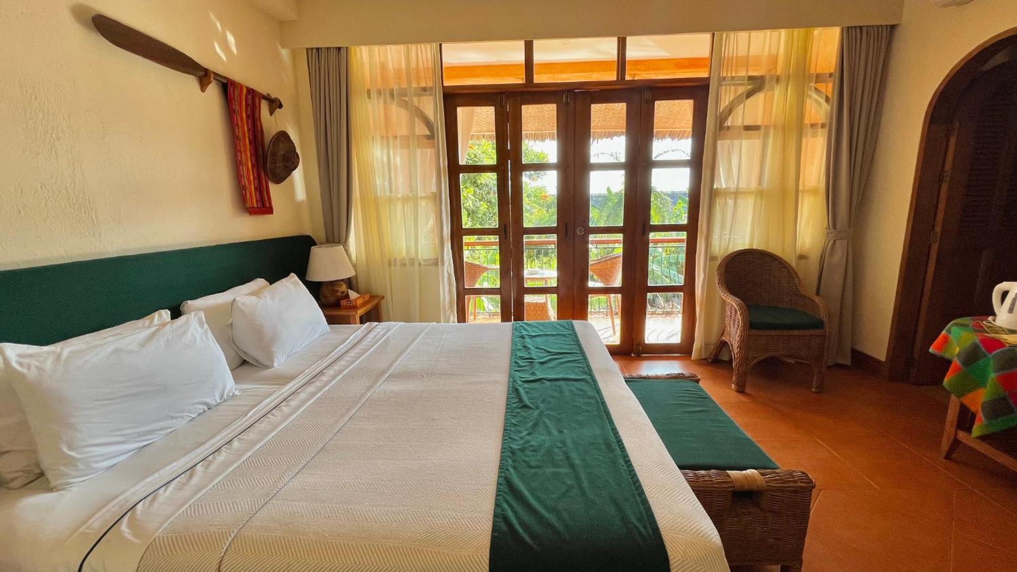 Coco Grove Beach Resort, Siquijor Island Quarto foto A room at the hotel